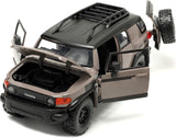 AUTO TOYOTA FJ CRUISER - TAN W-RACK 1:24 JADA TOYS JT-34008