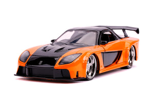 "Modelo a escala del Mazda RX-7 de Han en una vista lateral completa."