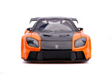  "Detalle del Mazda RX-7 de Han mostrando el acabado naranja y negro y las llantas deportivas."
