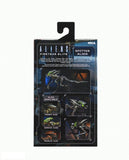 "Figura Aliens Fireteam Elite Spitter Alien en su empaque original de NECA mostrando su diseño detallado."