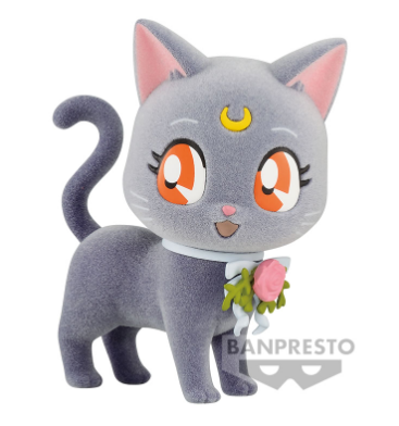 “Figura de Luna con textura aterciopelada y lazo decorativo.”