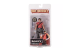“Figura Scout TF2 NECA en empaque original con armas incluidas.”