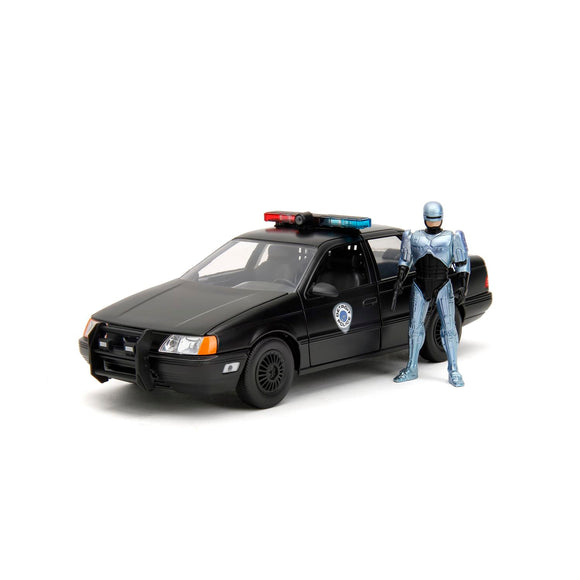 [PRE-VENTA] Auto 1:24 HWR 86 FORD TAURUS POLICE W/ROBOCOP   Jada toys  JT-33743 [PRECIO NORMAL S/.239]
