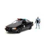 [PRE-VENTA] Auto 1:24 HWR 86 FORD TAURUS POLICE W/ROBOCOP   Jada toys  JT-33743 [PRECIO NORMAL S/.239]