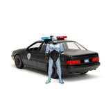 [PRE-VENTA] Auto 1:24 HWR 86 FORD TAURUS POLICE W/ROBOCOP   Jada toys  JT-33743 [PRECIO NORMAL S/.239]