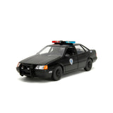 [PRE-VENTA] Auto 1:24 HWR 86 FORD TAURUS POLICE W/ROBOCOP   Jada toys  JT-33743 [PRECIO NORMAL S/.239]
