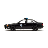 [PRE-VENTA] Auto 1:24 HWR 86 FORD TAURUS POLICE W/ROBOCOP   Jada toys  JT-33743 [PRECIO NORMAL S/.239]