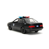 [PRE-VENTA] Auto 1:24 HWR 86 FORD TAURUS POLICE W/ROBOCOP   Jada toys  JT-33743 [PRECIO NORMAL S/.239]