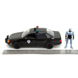 [PRE-VENTA] Auto 1:24 HWR 86 FORD TAURUS POLICE W/ROBOCOP   Jada toys  JT-33743 [PRECIO NORMAL S/.239]