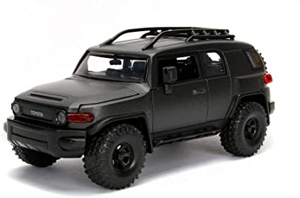 AUTO 1:24 TOYOTA FJ CRUISER gris osc. JADA 99318