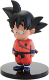 “Adorno de Goku niño sobre base negra – edición coleccionable Bandai.”