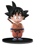 “Adorno de Goku niño sobre base negra – edición coleccionable Bandai.”