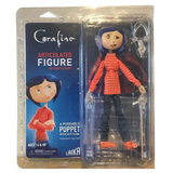“Empaque original de Coraline articulada NECA con ventana visible.”