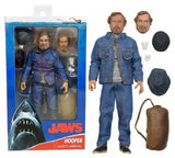 "Figura de Matt Hooper de JAWS de 7 pulgadas en su empaque original de NECA, mostrando el diseño detallado del personaje."