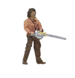  "Figura de Leatherface con su cabeza intercambiable y sierra eléctrica, lista para exhibir."