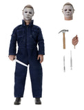 "Figura de acción Michael Myers con accesorios incluidos: cabeza intercambiable, cuchillo, martillo y jeringa."