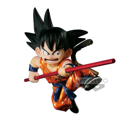 “Figura de Goku niño versión color especial con bastón extendido”