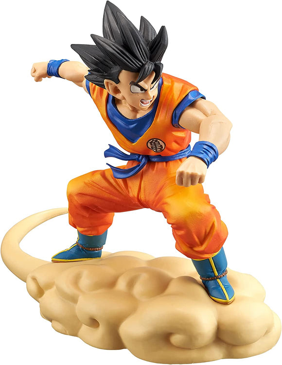  “Figura de Goku volando en su nube mágica con pose de ataque.”